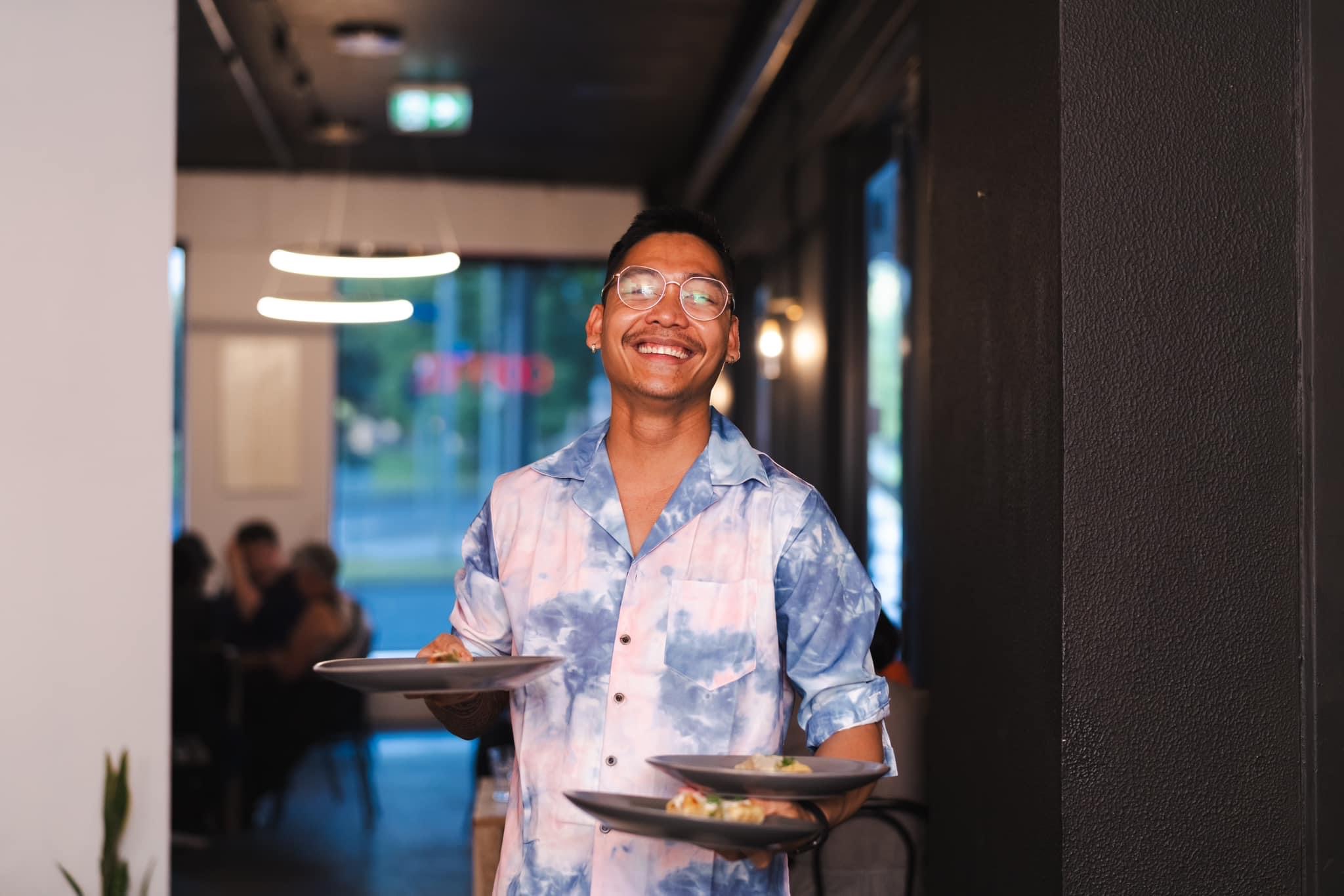Chef Fhred Batalona serving dishes at Palay